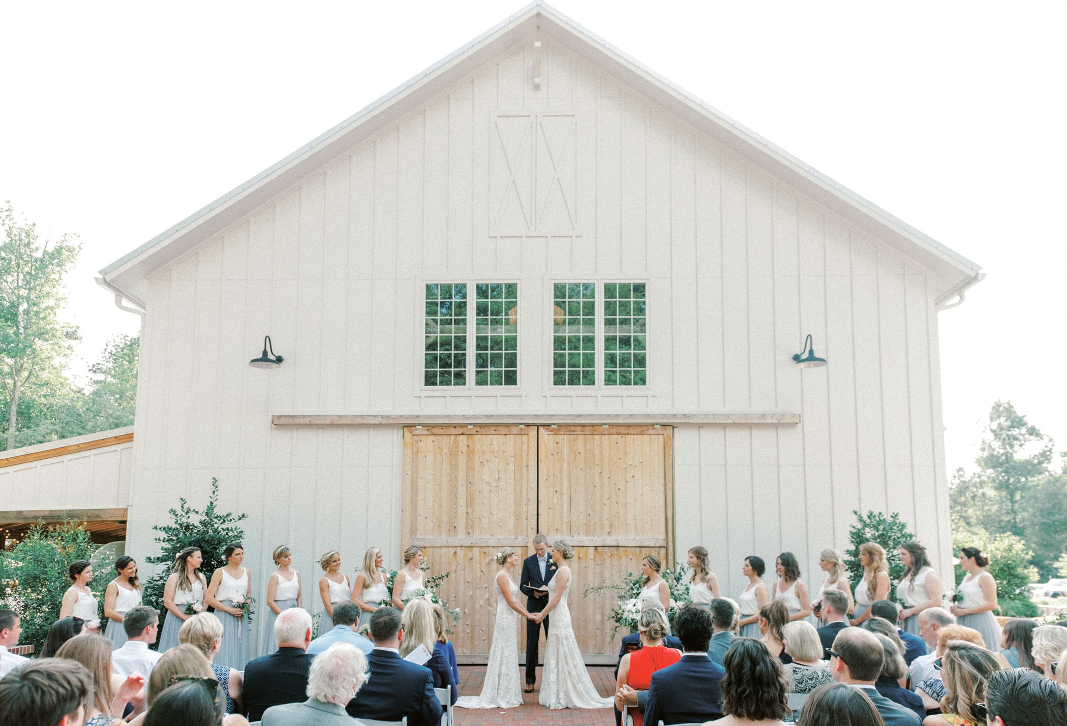 Kristine and Paige Falk at their wedding at The Barn of Chapel Hill at Wild Flora Farm
