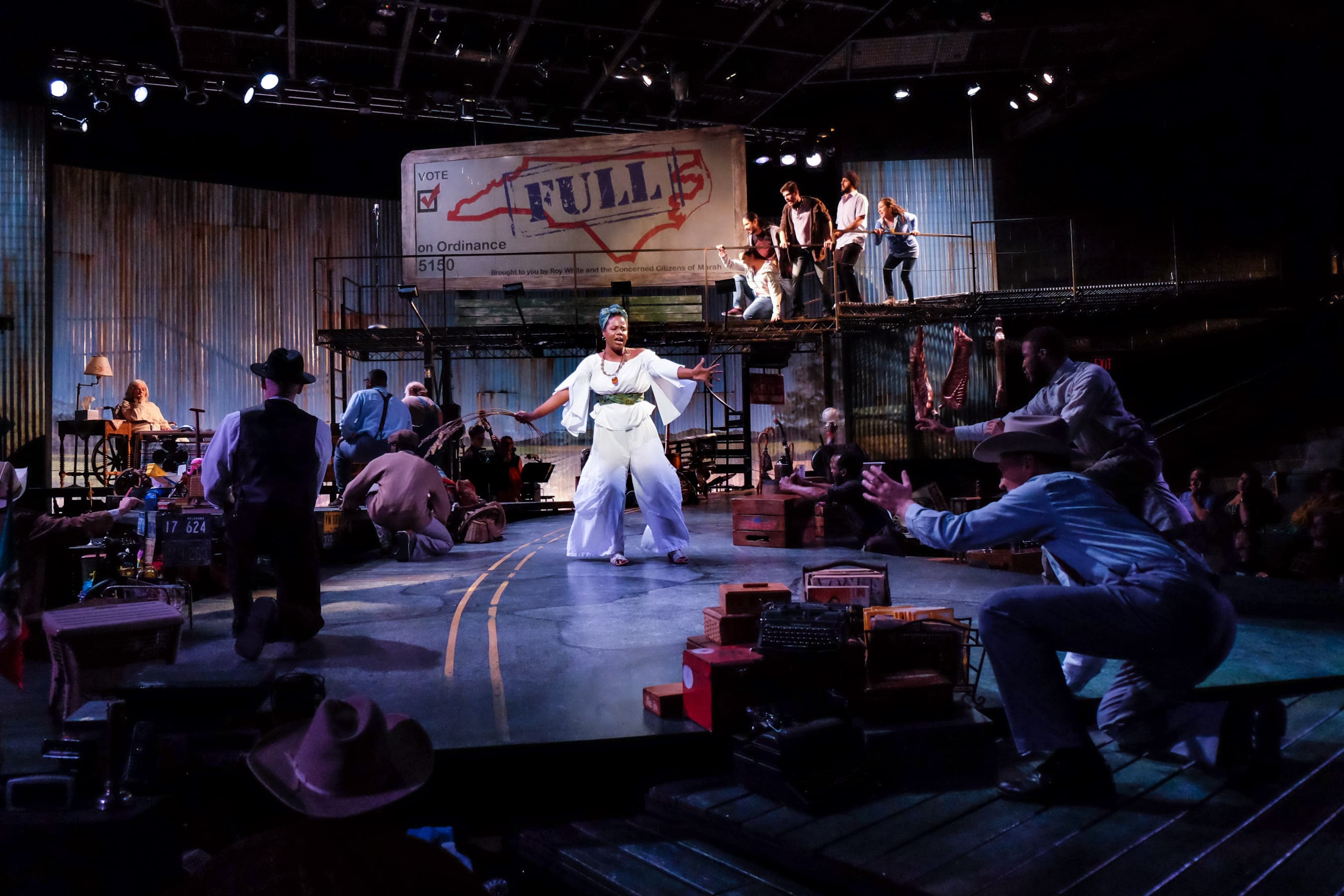 Tangela Large (center) as Selah with the cast of PlayMakers Repertory Company’s “Leaving Eden” by Mike Wiley, music & lyrics by Laurelyn Dossett. Photo by HuthPhoto.