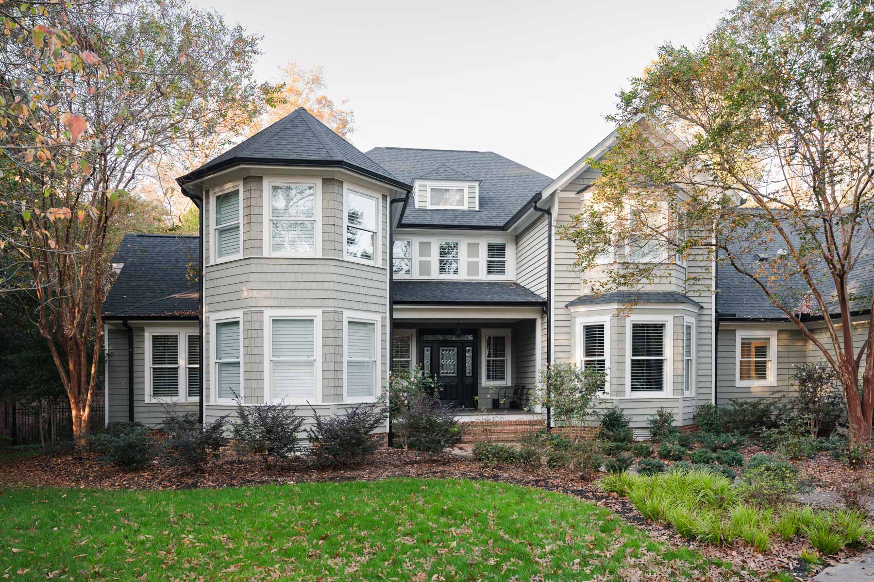 The front of Julie Jenning's 6,511-square-foot home viewed from the sidewalk leading up to the house.