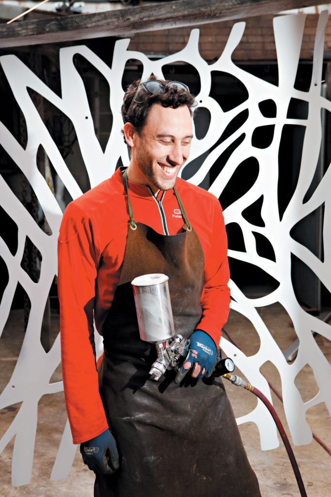 Leo Gaev creates metal art in his Carrboro workshop.