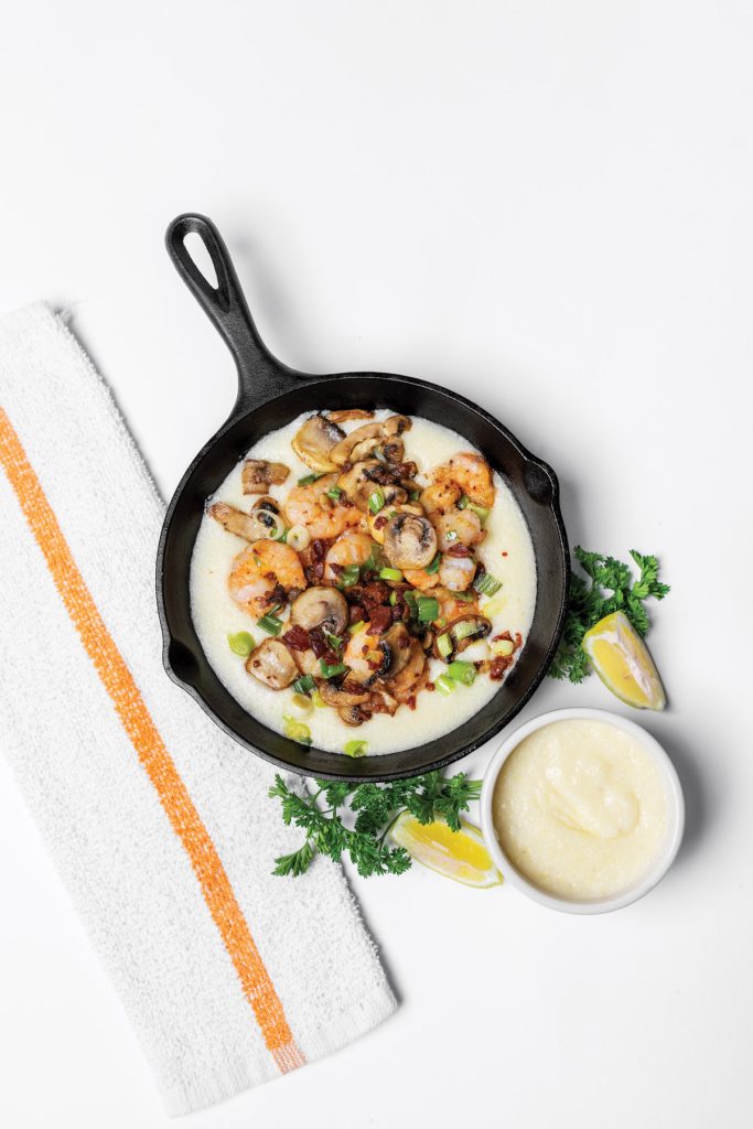 Shrimp and grits by Bill Smith served in a cast-iron skillet.