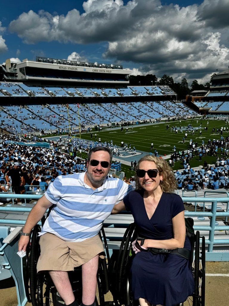 Stephanie Carmody and Dennis Carmody at a UNC football game.