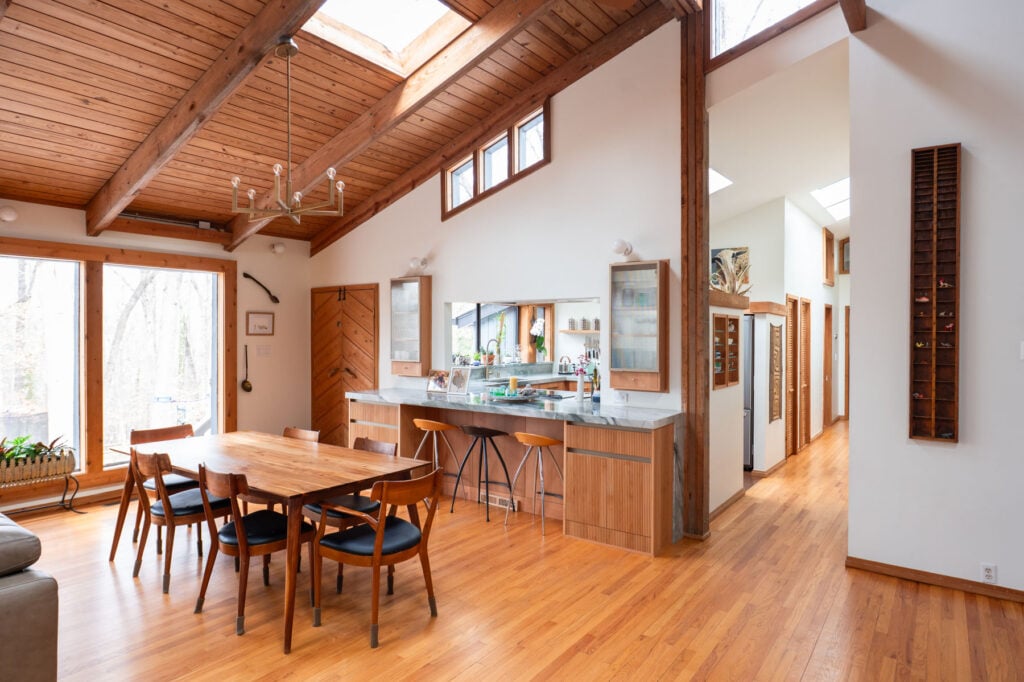 A renovated kitchen in Lake Forest showcases natural light across warm wood
