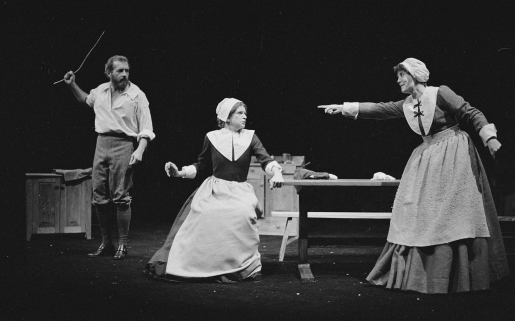 Black and white photo of actors onstage during PlayMakers Repertory Company's 1976 production of "The Crucible."